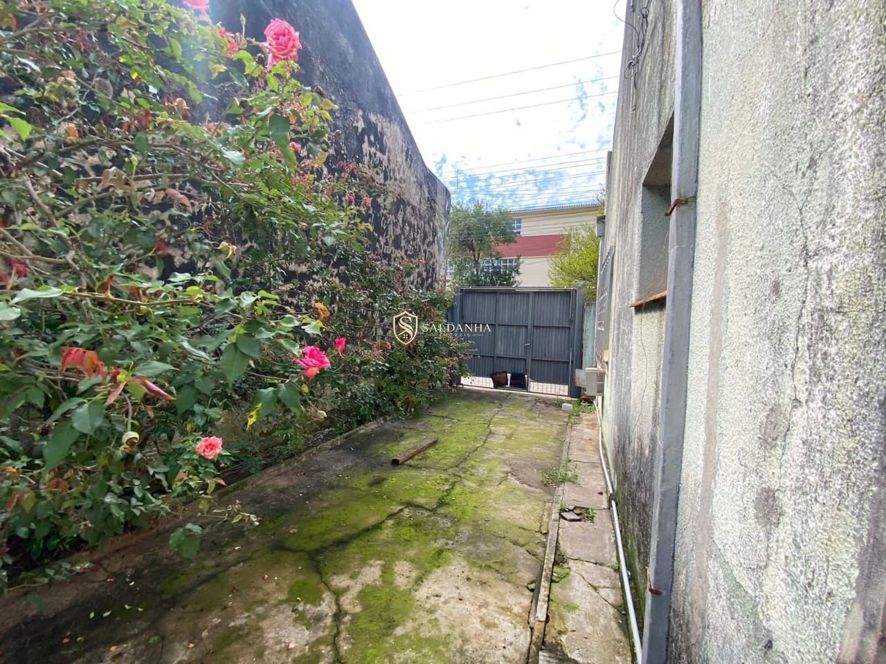 Casa ampla com 4 dormitórios e terreno de 513 m² no Centro
