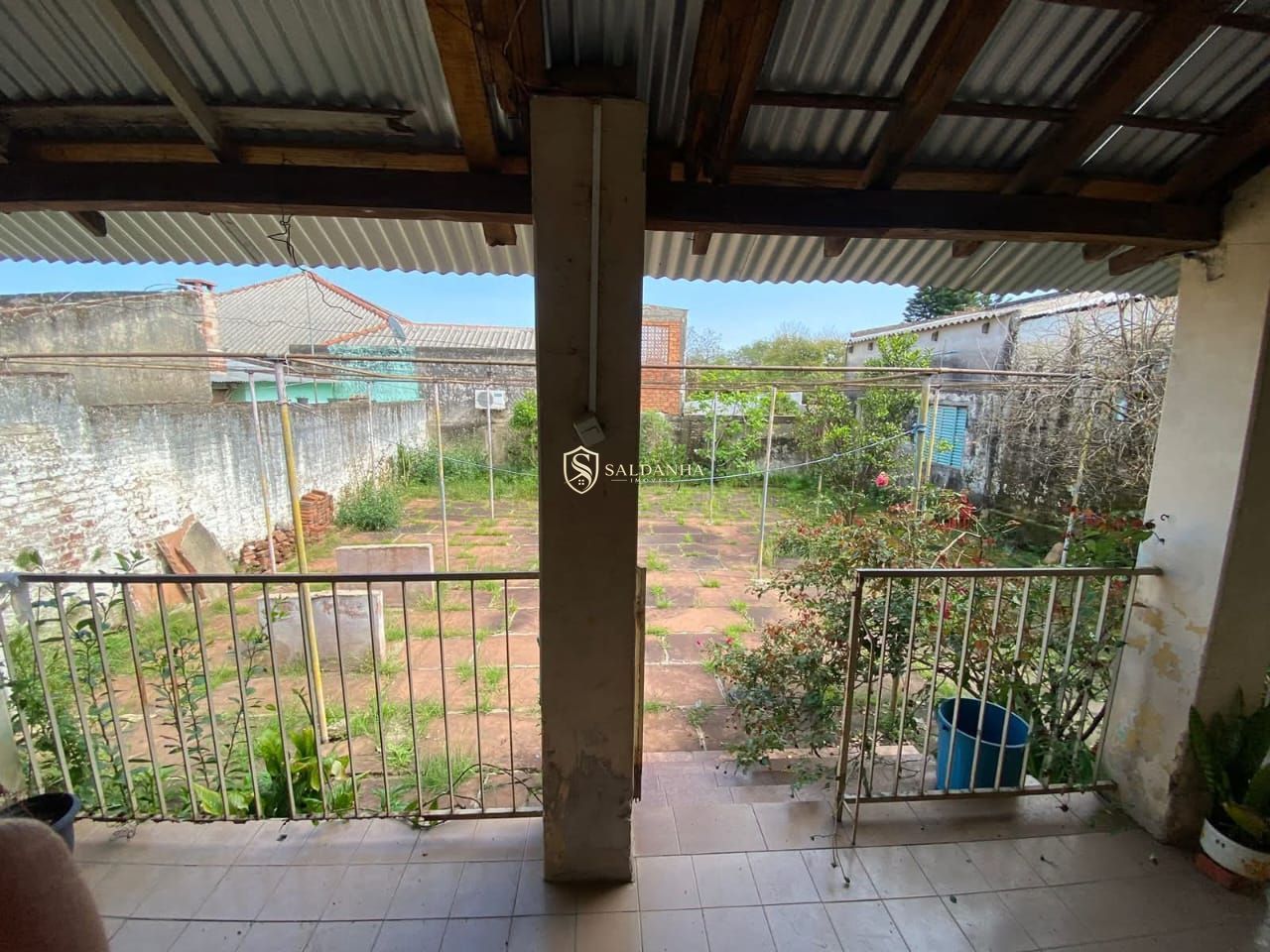 Casa ampla com 4 dormitórios e terreno de 513 m² no Centro