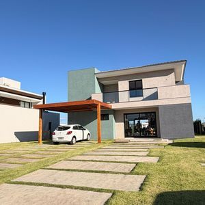Casa no Condomínio com 4 suítes + 1 suíte dependência