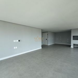 Apartamento com 108m², 3 dormitórios, 1 suíte, 2 vagas no Maui Residencial em Torres para Comprar