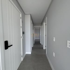 Apartamento com 102m², 3 dormitórios, 1 suíte, 2 vagas no Maui Residencial em Torres para Comprar