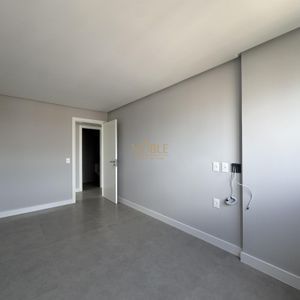 Apartamento com 102m², 3 dormitórios, 1 suíte, 2 vagas no Maui Residencial em Torres para Comprar