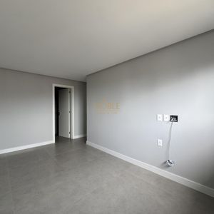 Apartamento com 108m², 3 dormitórios, 1 suíte, 2 vagas no Maui Residencial em Torres para Comprar