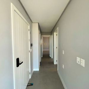 Apartamento com 102m², 3 dormitórios, 1 suíte, 2 vagas no Maui Residencial em Torres para Comprar