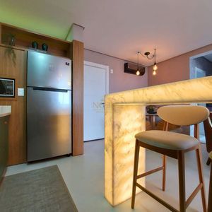 Apartamento com 72m², 2 dormitórios, 1 suíte, 2 vagas no Bellagio Residenziale em Torres para Comprar