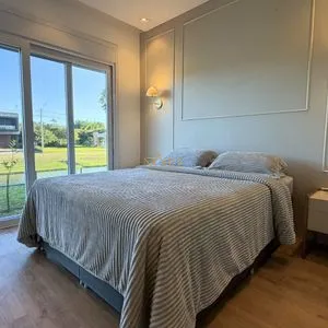 Casa de Condomínio com 206m², 4 dormitórios, 4 suítes, 2 vagas no Reserva das Águas em Torres para Comprar