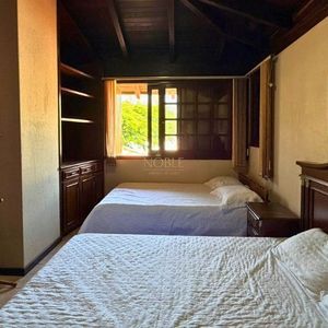 Casa com 193m², 3 dormitórios, 1 suíte, 3 vagas no bairro Praia Grande em Torres para Comprar