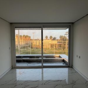 Casa com 474m², 4 dormitórios, 4 suítes, 2 vagas no Condomínio Ilhas Park em Torres para Comprar