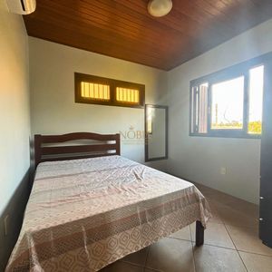 Casa, 3 dormitórios, 1 suíte, 2 vagas no bairro Itapeva Norte em Torres para Comprar