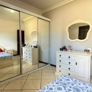 Casa com 145m², 3 dormitórios, 1 suíte, 2 vagas no bairro Igra Sul em Torres para Comprar