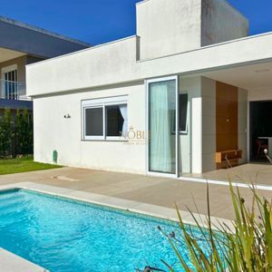 Casa com 230m², 3 dormitórios, 3 suítes, 4 vagas no Reserva das Águas em Torres para Comprar