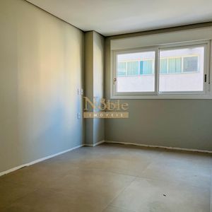 Apartamento com 119m², 3 dormitórios, 1 suíte, 2 vagas no Titanium em Torres para Comprar