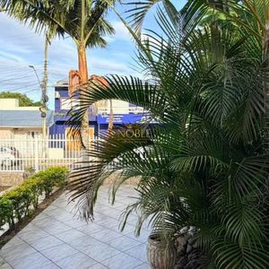 Casa com 171m², 4 dormitórios, 3 vagas no bairro Porto Alegre em Torres para Comprar