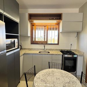 Casa com 95m², 2 dormitórios, 1 suíte, 2 vagas no bairro Praia Azul em Passo de Torres para Comprar