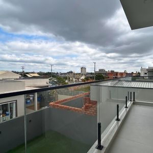 Casa com 140m², 3 dormitórios, 1 suíte, 2 vagas no bairro Morada das Palmeiras em Torres para Comprar