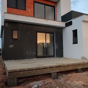 Casa de Condomínio com 204m², 3 dormitórios, 3 suítes, 2 vagas no Reserva das Águas em Torres para Comprar