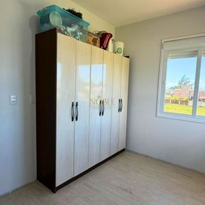 Casa com 226m², 3 dormitórios, 1 suíte, 2 vagas no bairro Paraíso em Torres para Comprar