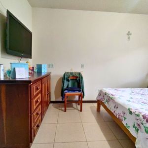 Casa, 6 dormitórios, 2 suítes, 3 vagas no bairro Getúlio Vargas em Torres para Comprar