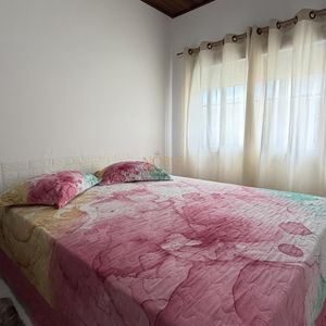 Casa com 136m², 3 dormitórios, 1 suíte, 2 vagas no bairro Praia da Cal em Torres para Comprar
