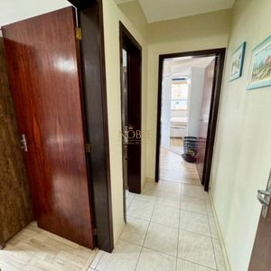 Apartamento com 65m², 2 dormitórios, 1 vaga no Edifício Porto Seguro em Torres para Comprar