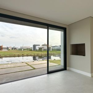 Casa de Condomínio com 228m², 3 dormitórios, 3 suítes, 2 vagas no Reserva das Águas em Torres para Comprar