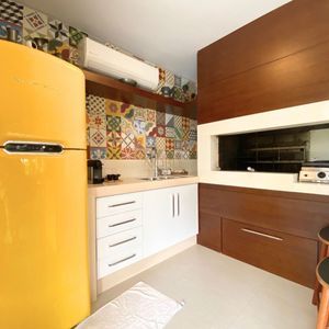 Casa com 518m², 5 dormitórios, 2 suítes, 2 vagas no bairro Praia Grande em Torres para Comprar