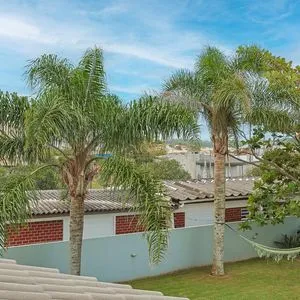 Casa, 4 dormitórios, 1 suíte, 2 vagas no bairro Itapeva Norte em Torres para Comprar