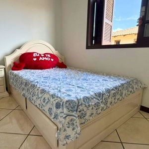 Casa com 145m², 3 dormitórios, 1 suíte, 2 vagas no bairro Igra Sul em Torres para Comprar