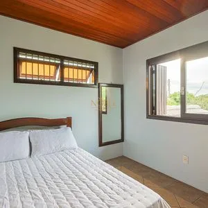 Casa, 4 dormitórios, 1 suíte, 2 vagas no bairro Itapeva Norte em Torres para Comprar