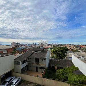 Apartamento com 59m², 2 dormitórios, 1 suíte, 1 vaga no Residencial Jardim Europa em Torres para Comprar