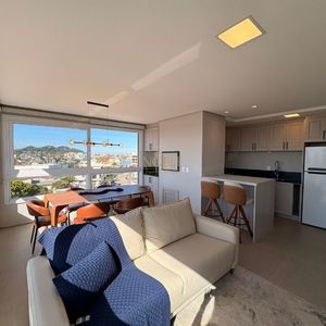 Apartamento com 72m², 2 dormitórios, 1 suíte, 1 vaga no Topazio em Torres para Comprar