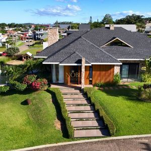 Casa de Condomínio com 623m², 4 dormitórios, 4 suítes, 4 vagas no Reserva das Águas em Torres para Comprar