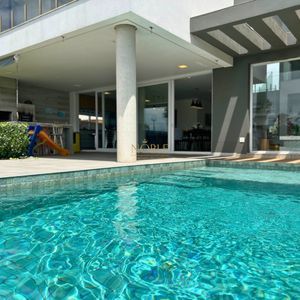 Casa de Condomínio com 348m², 4 dormitórios, 3 suítes, 2 vagas no Condomínio Ilhas Park em Torres para Comprar