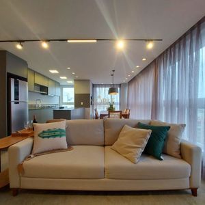 Apartamento com 102m², 3 dormitórios, 1 suíte, 2 vagas no Maui Residencial em Torres para Comprar