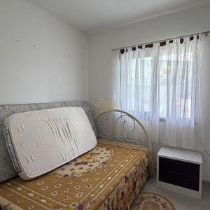 Casa com 136m², 3 dormitórios, 1 suíte, 2 vagas no bairro Praia da Cal em Torres para Comprar
