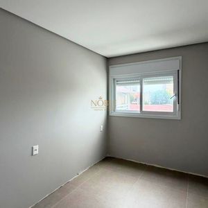Apartamento com 70m², 2 dormitórios, 1 suíte, 1 vaga no Topazio em Torres para Comprar