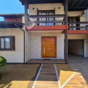 Casa, 3 dormitórios, 1 suíte, 2 vagas no bairro Stan em Torres para Comprar