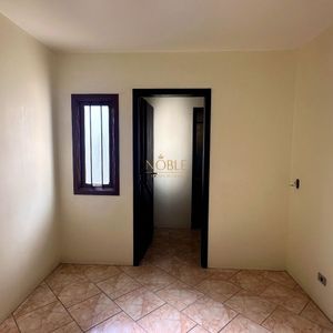 Casa com 420m², 5 dormitórios, 3 suítes, 1 vaga no bairro Centro em Torres para Comprar