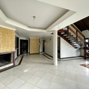 Casa com 180m², 4 dormitórios, 4 suítes, 2 vagas no bairro Praia da Cal em Torres para Comprar