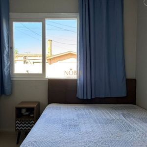Casa com 125m², 4 dormitórios, 1 suíte, 2 vagas no bairro Vila São João em Torres para Comprar