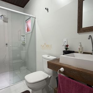 Casa com 136m², 3 dormitórios, 1 suíte, 2 vagas no bairro Praia da Cal em Torres para Comprar
