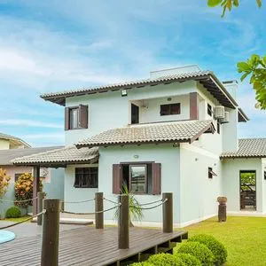 Casa, 4 dormitórios, 1 suíte, 2 vagas no bairro Itapeva Norte em Torres para Comprar