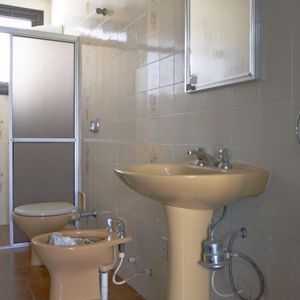 Casa com 260m², 5 dormitórios, 1 suíte, 2 vagas no bairro Praia Grande em Torres para Comprar