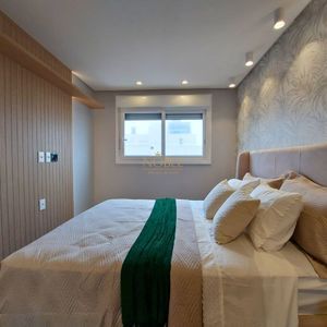 Apartamento com 90m², 2 dormitórios, 2 suítes, 2 vagas no Maui Residencial em Torres para Comprar