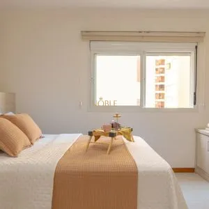Apartamento com 125m², 3 dormitórios, 1 suíte, 2 vagas no Elegance em Torres para Comprar