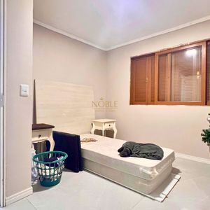 Casa com 127m², 2 dormitórios no bairro Vila São João em Torres para Comprar