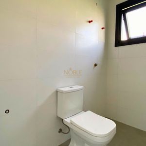 Casa com 201m², 3 dormitórios, 3 suítes, 2 vagas no Reserva das Águas em Torres para Comprar