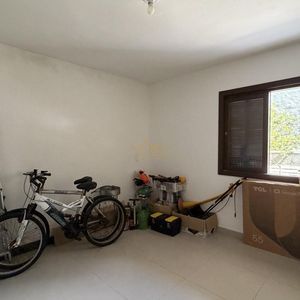 Casa com 136m², 3 dormitórios, 1 suíte, 2 vagas no bairro Praia da Cal em Torres para Comprar