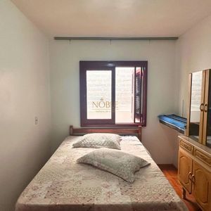 Casa, 6 dormitórios, 2 vagas no bairro Praia da Cal em Torres para Comprar