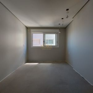 Apartamento com 114m², 3 dormitórios, 1 suíte, 2 vagas no Titanium em Torres para Comprar